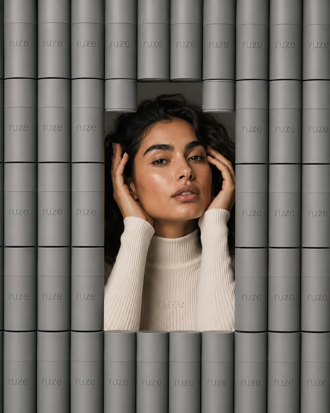 editorial-beauty-portrait-amid-gray-bottle-grid