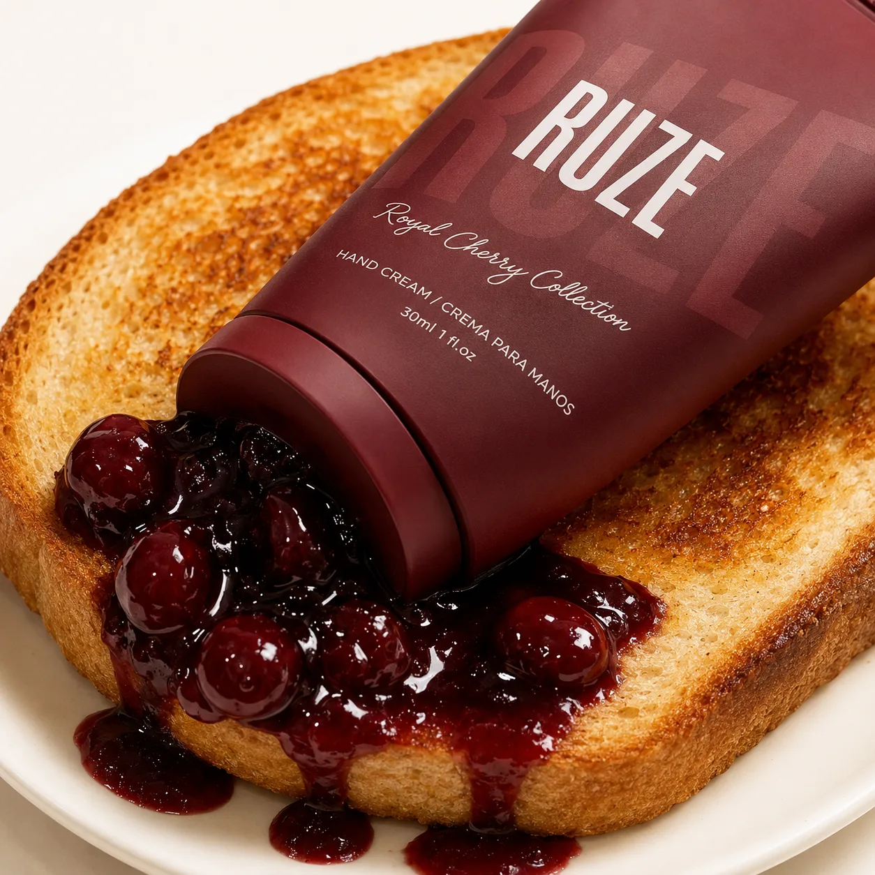 maroon hand-cream tube with cherry jam on toast - product macro
