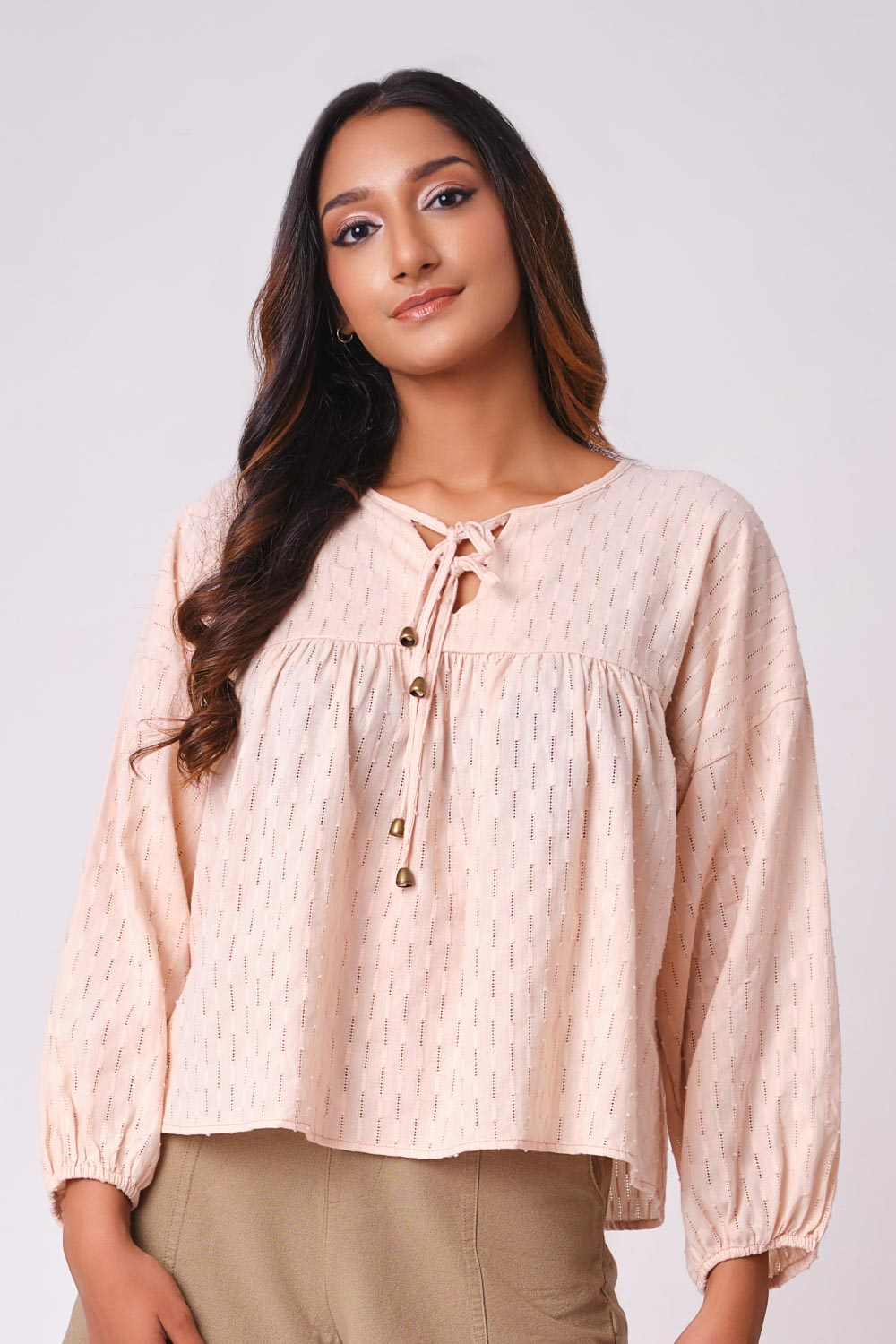 Cream flowy sales top