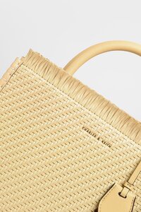 frayed woven tote bag